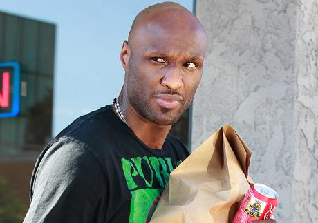 Lamar Odom keeps his wedding band visible as he goes to buy to go food at VeStation Vegan Cuisine in Sherman Oaks and went home with Khloe saturday august 31, 2013 X17online.com