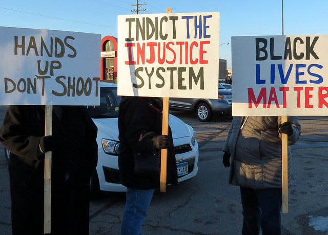 Marchers protest police shootings in Rochester, Minnesota following the shooting of Michael Brown in Ferguson, Mo in 2014.