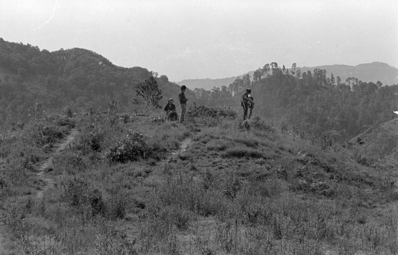 Peoples Revolutionary Army (ERP) soldiers stand in the mountains of  Perquin, El Salvador, 1990.