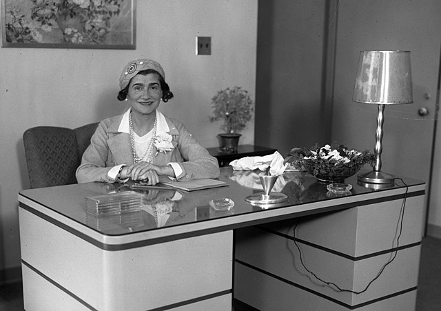 Coco Chanel, who was a Nazi spy, sits at a desk in Los Angeles in 1931.

From Los Angeles Times provided via Creative Commons.