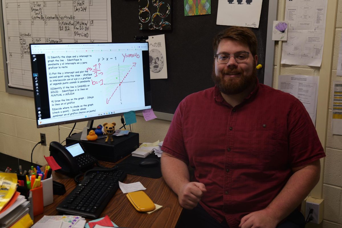 Second-year teacher Kevin DeSalvo cares about his students and teaches them to appreciate math.